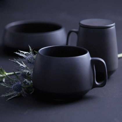 black pottery tea cup