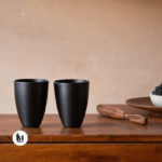 black pottery glass set